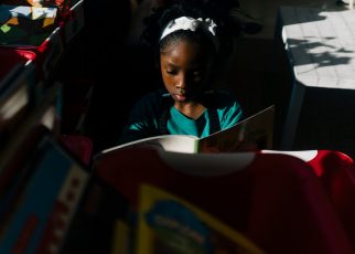 Ari Cotton, a first grader, reading a book at Garrison Elementary School in Washington, D.C.