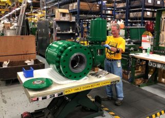 A worker assembling an industrial valve at an Emerson Electric factory in Marshalltown, Iowa.Photo: tim aeppel/Reuters